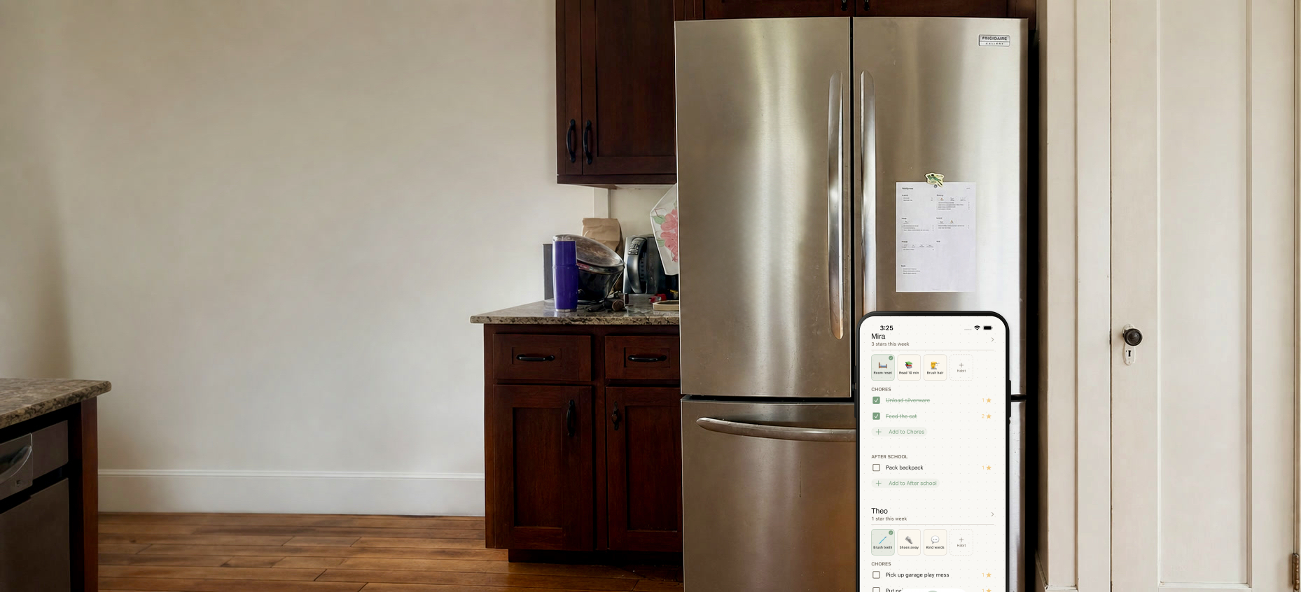 The Choreeo app shown below a printed chore chart on a refrigerator.